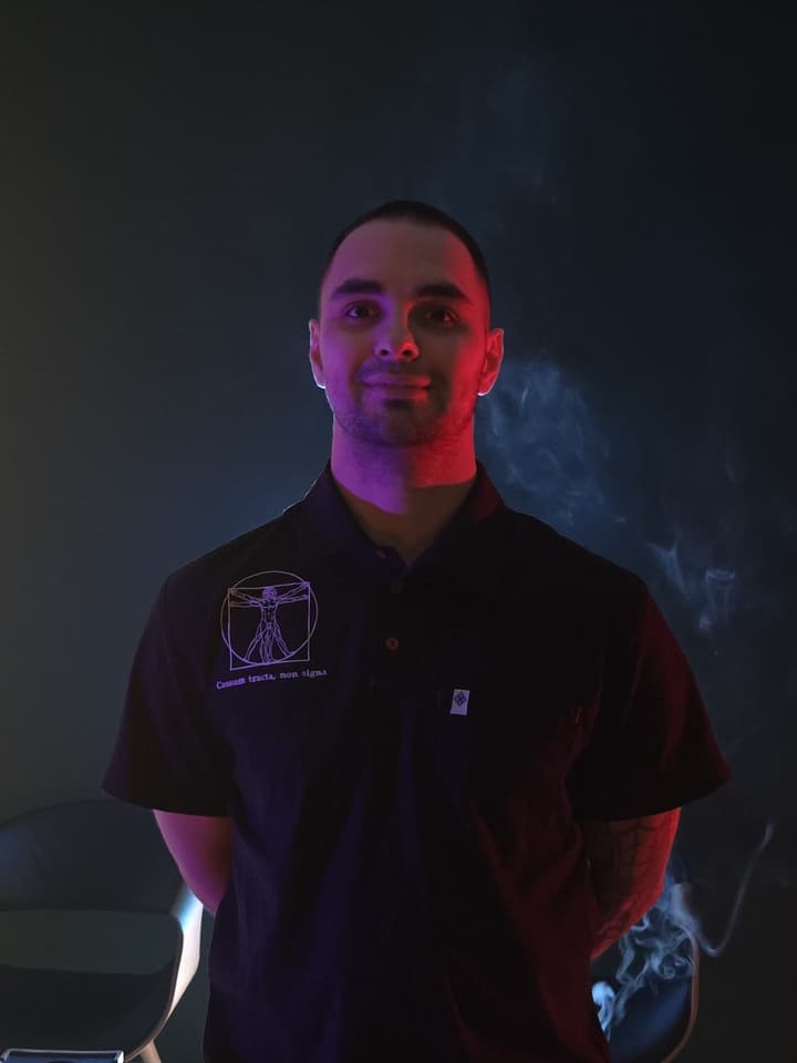 Andrii Kuzmynchuk in a black polo shirt with the Edelweiss logo